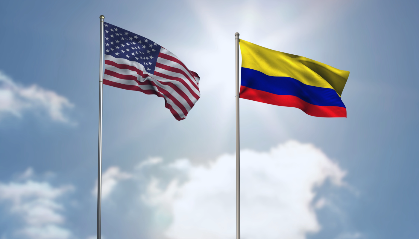 United States and Colombian flags representing an FBI background check apostille for a Colombian visa.